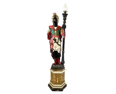 Standard lamp in the form of a  Moorish courtier holding a light in the form of a torch staff, H200cm