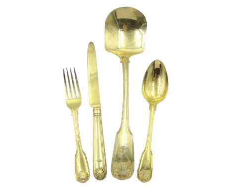 George III silver gilt fiddle, thread and shell pattern dessert service comprising fourteen forks, fourteen spoons, fourteen 