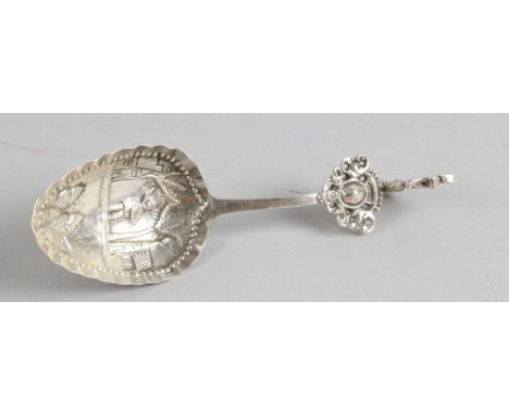 Large Dutch silver caddy spoon with rural scenes .   