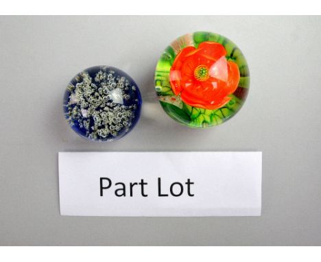 Four paperweights and a collection of glassware,.   Glass paperweight with orange flower some light scratches, no other major