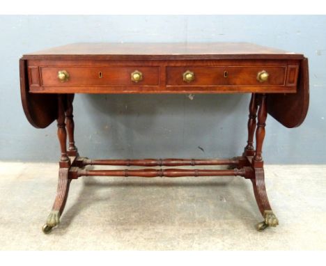 Mahogany sofa table with two drawers and a mahogany nest of tables.   