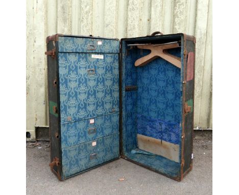 Leather and metal travelling trunk with fitted interior.   