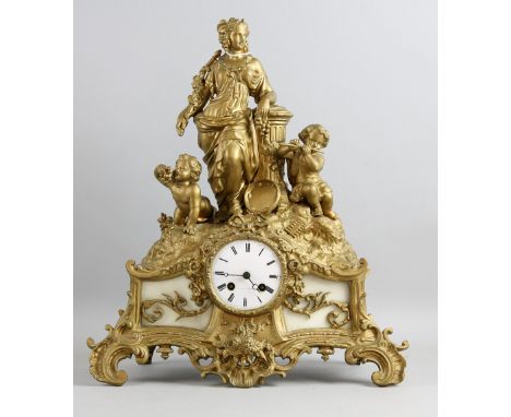 Gilt metal clock.   