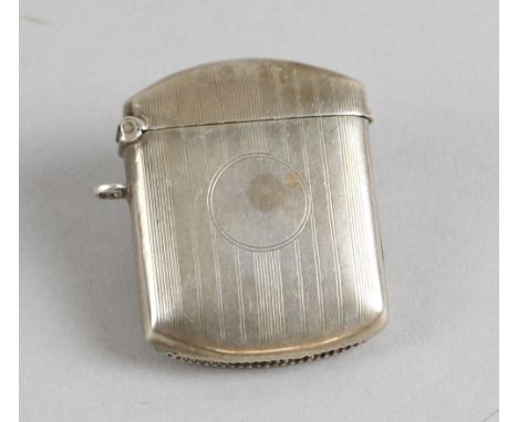 Silver vesta case with engine turned decoration and vacant cartouche by William Hair Haseler, Birmingham 1922.   