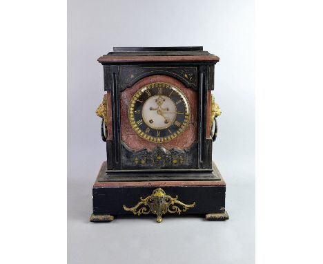Large black marble and pink rouge mantel clock with breget escapement, two train movement, lion mask ring handles and portrai