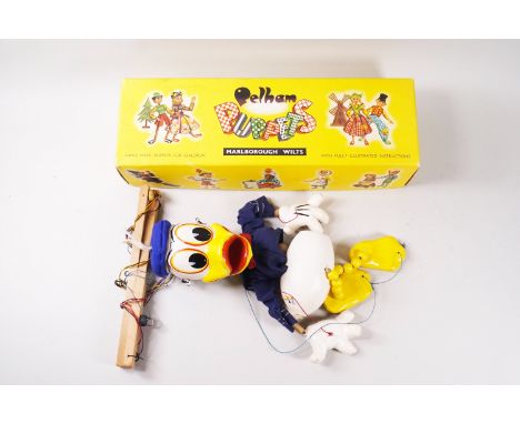 A Pelham Puppet 'Donald Duck' 1960's, boxed, This puppet was given to Beryl Lewis who worked in the sewing room for Pelham Pu