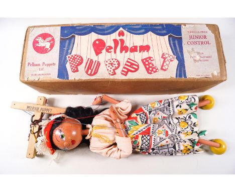 A Pelham Puppet 'Mexican Girl', 1950's, with original instructions and box