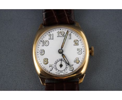 A yellow gold wristwatch with 9ct gold Dennison case, hallmarked for Birmingham, 1946 A.L.D. Case reference: 64192 / 12100 / 