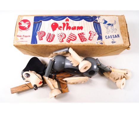 A Pelham Puppet 'Caesar' the dog, 1953, with original instruction leaflet and letter from The Pelpup Club, boxed with applied