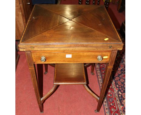 An Edwardian mahogany and satinwood inlaid envelope card table, having a green baize lined interior, single frieze drawer, to