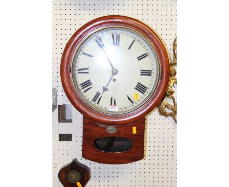 A Victorian mahogany circular droptrunk wall clock, the single winding hole with fusee movement, bears applied brass label st