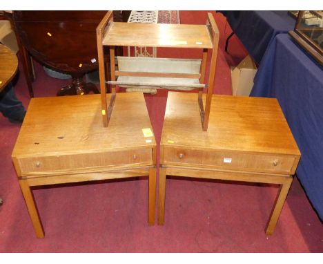 A pair of 1970s teak square single drawer lamp tables, width 59.5cm, together with a small magazine table with canvas underti