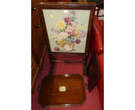 A Victorian mahogany and floral tapestry inset fire screen, with rise and fall panel, together with a further early 20th cent