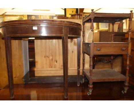 An early 19th century mahogany and chequer strung demi lune fold-over baize lined card table on square tapering supports, wid