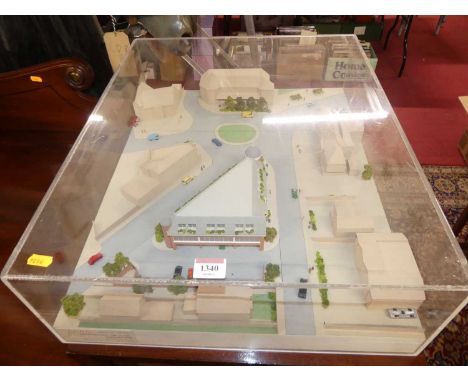 A table top scale architectural model of The Tredway House, Baring Road, Beaconsfield, housed in a perspex box by The Archite