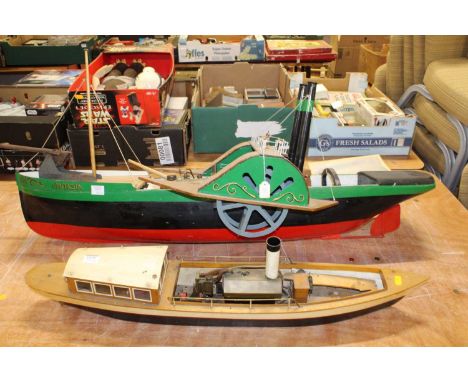 A scratch built live steam powered model of a Norwich pond yacht, together with one other steam launch, both fitted with hori