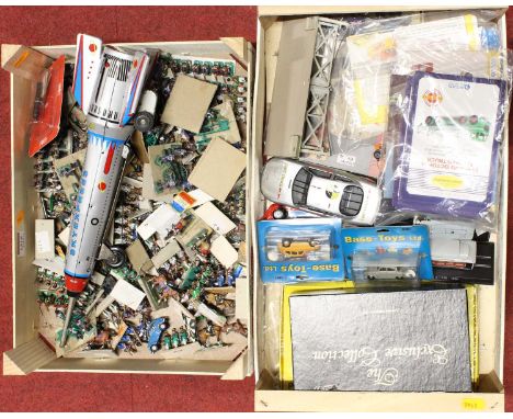 Two trays of mixed toys to include various 25mm scale war gaming figures, a Hungarian tinplate space rocket and others