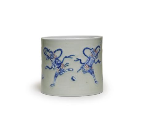 A RARE CELADON-GROUND BLUE AND WHITE AND COPPER-RED GLAZED 'KUI XING' BRUSHPOT, BITONGKangxiFinely potted with straight sides