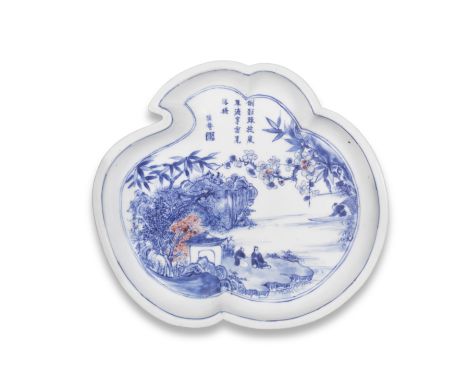 A RARE BLUE AND WHITE AND COPPER-RED PEACH-SHAPED DISHKangxiFinely potted in the shape of a peach with gently curving sides a