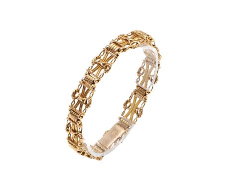 A LATE VICTORIAN 15CT GOLD GATE BRACELET. with rope decoration and concealed clasp, 18cm long, 28 grams.  *CR  With some ligh