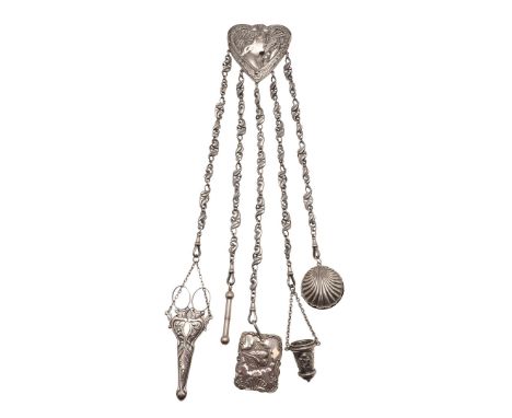 A SILVER CHATELAINE. of Art Nouveau design, the heart shape suspensory panel with female portrait (by Wm. Comyns 1900) and fi