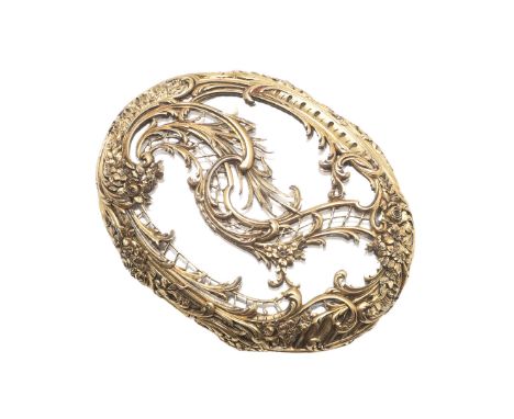 A SILVER GILT COMPACT MIRROR BY BOUCHERON. of oval-shape, each mirrored side enclosed by foliate and scrolling silver gilt de