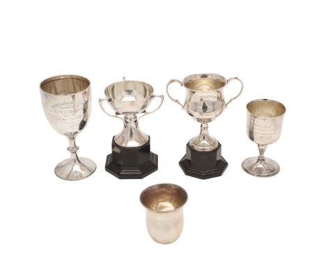 A GEORGE V SILVER GOBLET. with a campana shaped bowl, a baluster stem and on a circular foot, the whole with a spot-hammered 