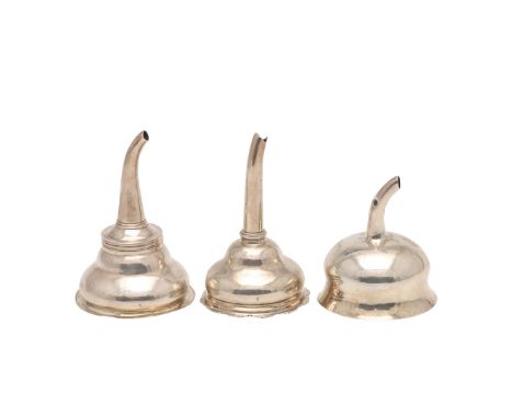 THREE SILVER WINE FUNNELS. one with a reeded border, by Charles Aldridge & Henry Green, London 1773, one with a textured bord