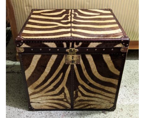 ZEBRA SKIN TRUNK, square form brown leather with brass studs and carrying handles, 63cm H x 67cm x 57cm. 