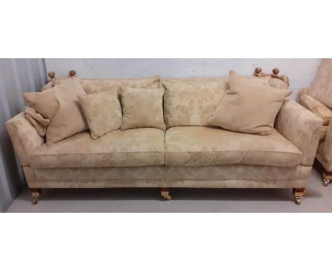 DURESTA SOFA, foliate patterned upholstery with scatter cushions, brass castors, with drop down ends, 85cm H x 228cm W x 110c