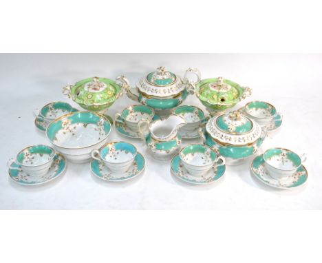 A Ridgway part service, decorated with a green and gilt leafy design, comprising: eight cups; eight saucers; teapot; milk jug