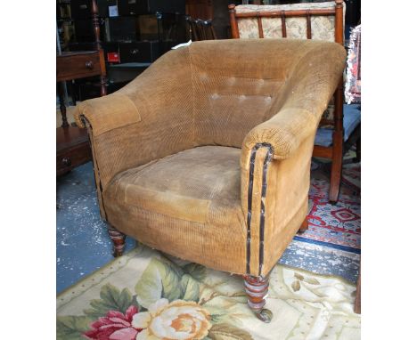 A Victorian tub library armchair by Gregory & Co, London, button upholstered in buttoned cord upholstery, raised on turned ma