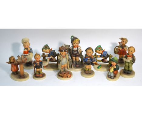 Eleven Goebel Hummel figures comprising:  Little Hiker; Soloist; Singing Lesson; Barnyard Hero; Retreat to Safety; Bird Duet;