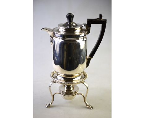 An Edwardian heavy quality silver hot water jug on stemmed foot with ebonised handle, to/w an associated spirit-burner and st