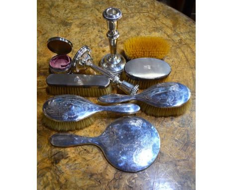 An engraved silver ring-box with matching hand-mirror and two brushes, Birmingham 1916/17, to/w a pair of loaded silver balus