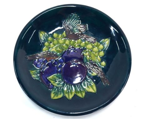 Moorcroft plate decorated with three birds, plums and grapes by Jackie Norcup (Rowe), painted monogram of William John Moorcr