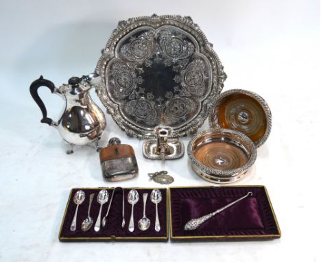 An electroplated engraved salver with beaded rim, on claw and ball feet, Goldsmiths & Silversmiths Co. Ltd., to/w two plated 