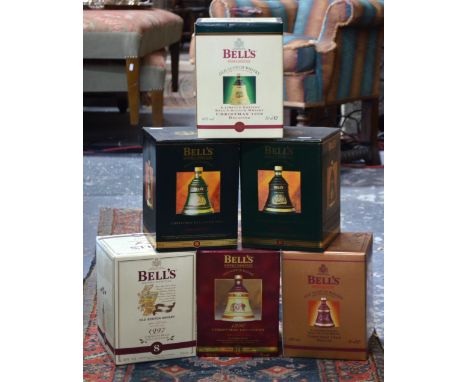 Six Bells Old Scotch Whisky Wade Christmas decanters, un-opened with contents, 1994-1999 (6)