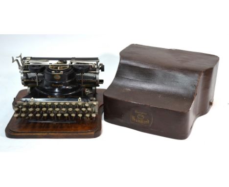 A Hammond Multiplex portable typewriter with plywood case, circa 1915