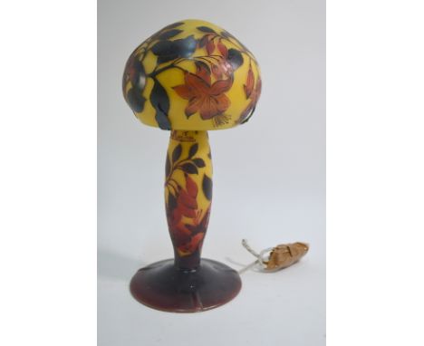 A Muller Freres Cameo Glass lamp on conical, circular base; decorated with floral and butterfly designs, 37cm high, signed 'M
