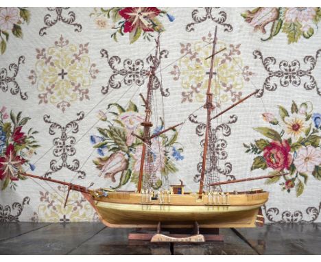 A wooden model of a two-masted schooner, Le Hussard, 55 x 72 cm overall