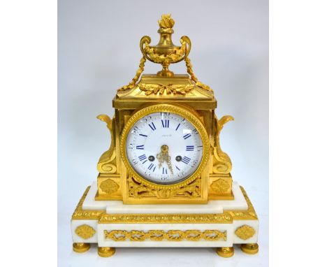 A mid 19th century French ormolu and white marble mantel clock, the 8-day two train drum movement signed Vincenti and strikin