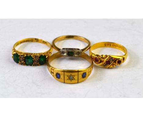 A collection of four stone set rings including ruby and diamond, green stone and rose diamond, both 18ct, green stone ring wh