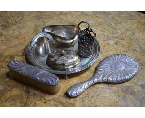 An Edwardian small silver cream jug of plain tapering form, Hukin & Heath, Birmingham 1901, to/w a silver-backed hand-mirror 