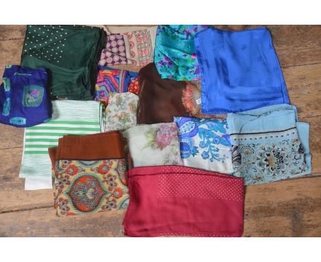 A collection of mostly silk vintage scarves