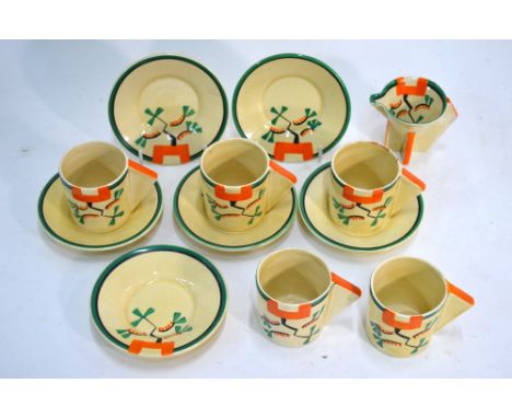 Clarice Cliff Bizarre conical part coffee service, Ravel pattern, c. 1929, comprising a cream jug, five coffee cans and six s