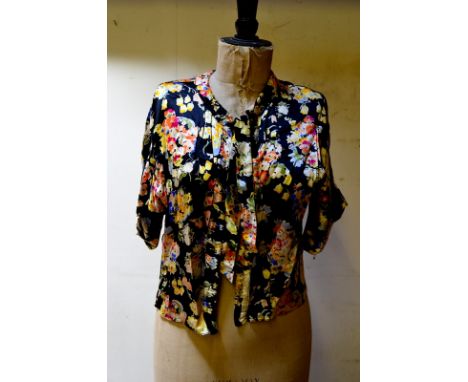 Two boxes boxes of assorted vintage clothing to include a top with stitch-worked panel, a Victorian black silk pleated skirt,