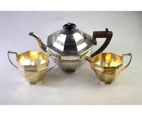 An octagonal silver three-piece tea service, Thomas Edward Atkins, Birmingham 1910, 21 oz gross