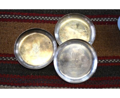 Special Air Service (S.A.S) interest: a set of three circular silver coasters by The Goldsmiths & Silversmiths Company Ltd./1