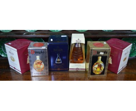Three Bells Scotch Whisky Wade decanters, un-opened with contents, commemorating: Golden Jubilee 2002, 2 x Christmas 2000 to/